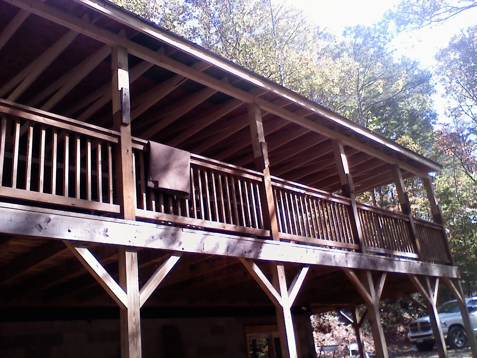 Timber framing under a new elevated porch and deck — Roof Leak Repair in Beaumont by Roofing Brothers